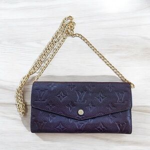 Authentic Louis Vuitton Monogram Portefeuille Curieuse Empriente wallet on chain